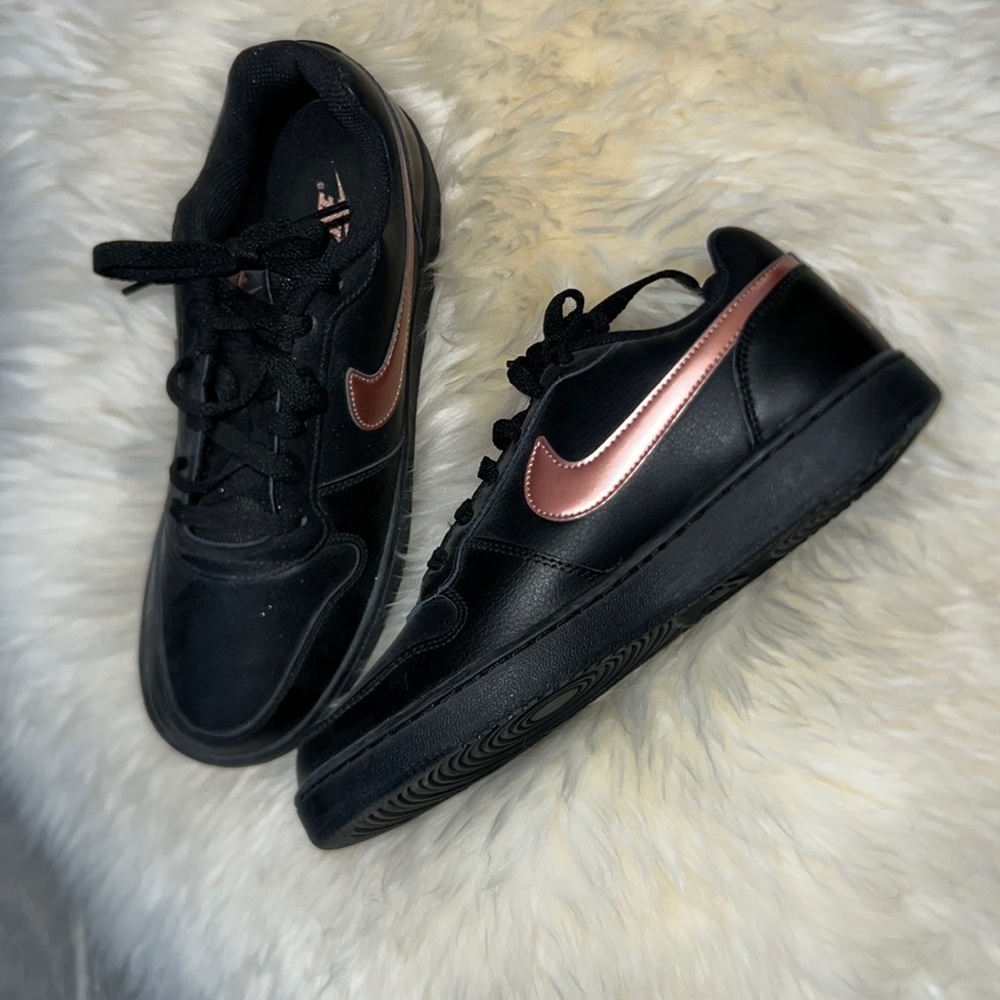 Nike Women’s Black with rose gold trim.